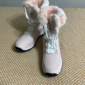 EARLDE womens snow boot with waterproof lace up mid calf. Size 10.5